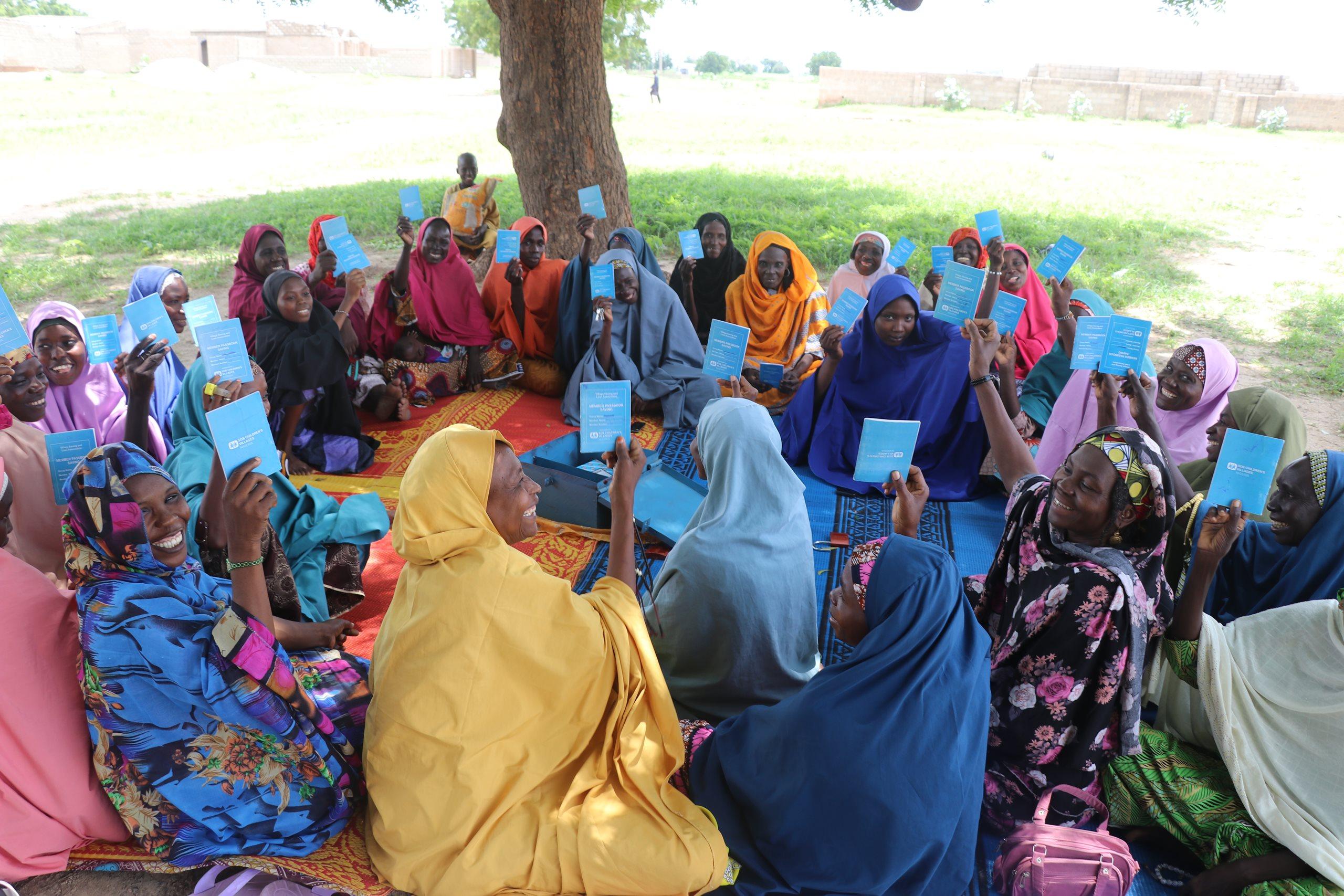 Community outreach program with women seated